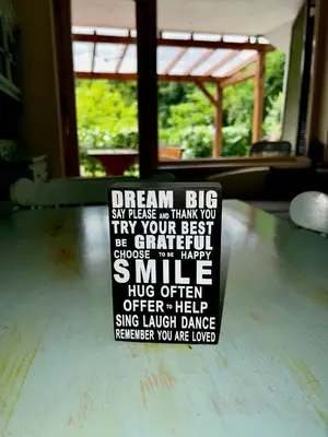 a sign that says dream big on a table at Relax in nature Apartment in Bovec