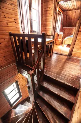 an overhead view of a staircase in a wooden cabin at Mala koča Wooden Cabin in Goreljek