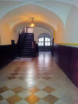 an empty hallway with stairs in a building at Studio Ian in Ljubljana