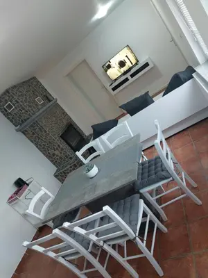 an overhead view of a living room with a table and chairs at Apartma Sandi in Šentilj