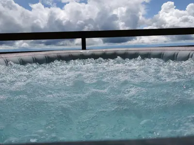 a large pool of water in a swimming pool at Apartma na KOZOLCU in Dobovec