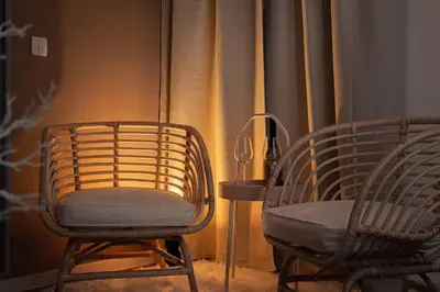 two chairs and a table in a room at New Cute Studioapartment in Ljubljana + Free bikes in Ljubljana