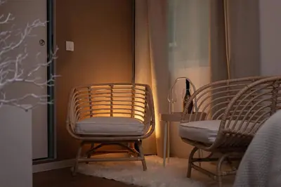 a room with two chairs and a table at New Cute Studioapartment in Ljubljana + Free bikes in Ljubljana