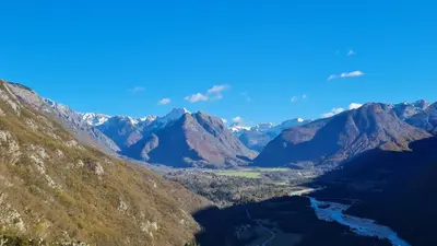 an aerial view of a valley in the mountains at Stara Hiša in Log Čezsoški