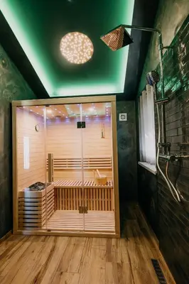 a large shower in a room with a green ceiling at Villa Sunset Pool & Spa apartments in Zgornje Škofije