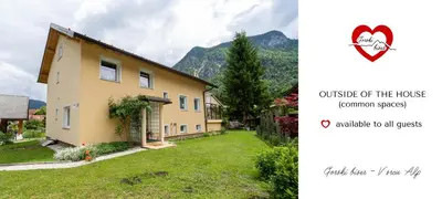 a picture of a house and a picture of a house at Gorski biser in Mojstrana