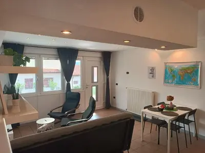 a living room with a couch and a table at Apartma 31 in Nova Gorica