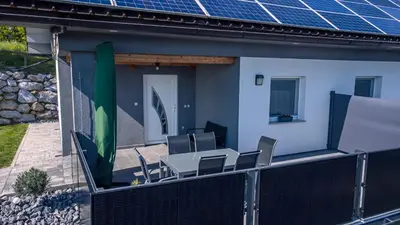a house with solar panels on the roof at Apartmaji Gračner in Dramlje