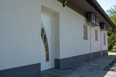 a door on the side of a building at Apartmaji Gračner in Dramlje