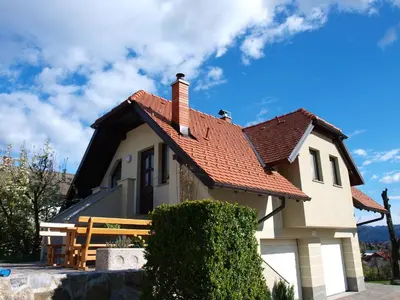 a small house with a red roof at Apartment Knap in Cerknica