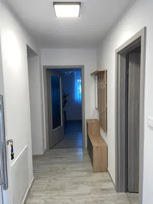a hallway with a hallway leading into a room at APARTMA DŽANA in Žaga