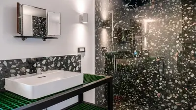 a bathroom with a sink and a shower at Vila Vrba in Žirovnica