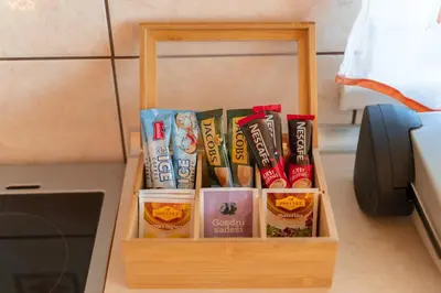 a wooden box with some food in a kitchen at Holiday Home Lanita with Two Bedrooms & Terrace in Podbočje