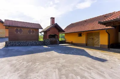 an empty driveway in front of a house at Holiday Home Lanita with Two Bedrooms & Terrace in Podbočje