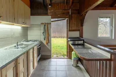 a kitchen with a sink and a counter top at Holiday Home Lanita with Two Bedrooms & Terrace in Podbočje