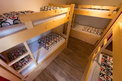 an overhead view of a room with bunk beds at Hostel Soča Rocks in Bovec