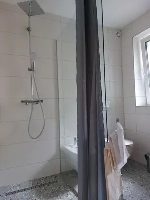 a bathroom with a shower and a sink at Apartma Sava-Stol in Jesenice