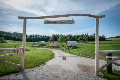 a sign that reads russellucky trailer in a field at Cowboy's Land in Višnja Gora