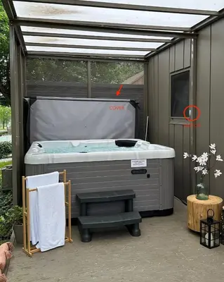 a hot tub sitting inside of a shed with a roof at MAGNOLIA HOUSE by the RIVER XL in Metlika