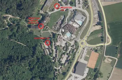 a map of a park with red arrows at Olimian Oasis Village Lipa 107 in Podčetrtek