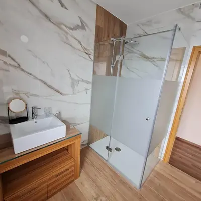 a bathroom with a shower and a sink at Soba pri nam in Gačnik