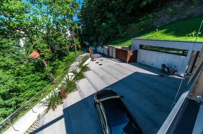 a car parked on a deck of a house at Studio na Stolbi in Ljubljana