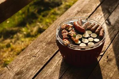a bowl of food sitting on a wooden table at Ladybug Eco House in Gradišče pri Lukovici
