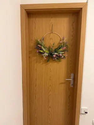 a wreath on the door of a room at Lorume in Postojna