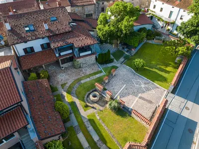 an aerial view of a house with a yard at Guest House Žerjal in Podnanos