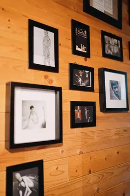 a wall with pictures of people on it at Private Cottage near Ljubljana in Škofja Loka