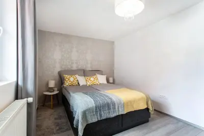 a bedroom with a bed in a room at Ljubljana sLOVEnia + FREEparking & Bikes in Ljubljana