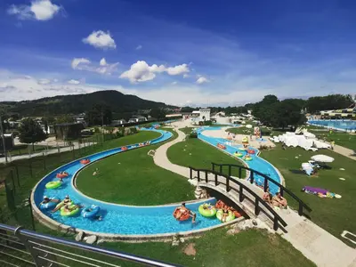 a group of water slides at a water park at Cosy Retreat Čatež in Čatež ob Savi