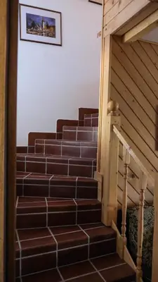 a set of stairs in a building at Holiday Home Kersnik in Bohinj