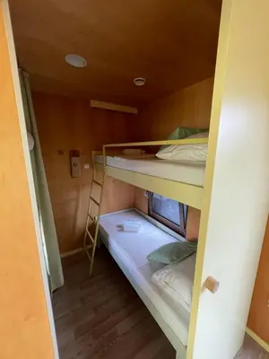 a room with two bunk beds and a ladder at BIG BERRY Kolpa - Isabella Premium House in Gradac