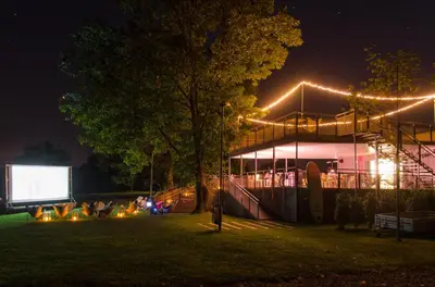 a large building with lights on it at night at BIG BERRY Kolpa - Isabella Premium House in Gradac