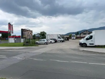 a group of cars parked in a parking lot at Granny's Vintage Chic in Maribor