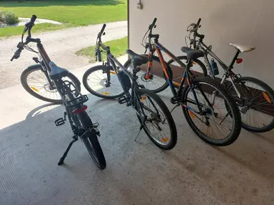 a group of bikes parked next to a building at Apartma Vida in Videm pri Ptuju