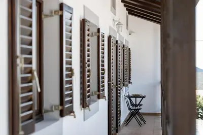 a hallway with a row of wine racks on the wall at Vila Sistiana in Kostanjevica na Krasu