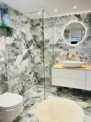 a bathroom with a toilet and a sink at Apartma Tany in Ljubljana