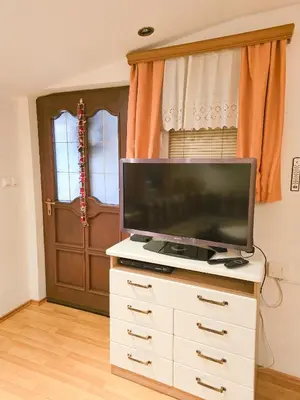 a television on a dresser in a room at House Banovci in Banovci