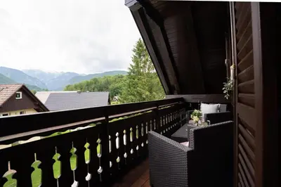 a balcony with a view of the mountains at View apartment Lenart in Bohinj