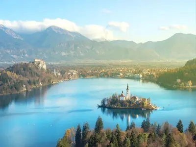 an island with a church in the middle of a lake at Art House Radovljica in Radovljica