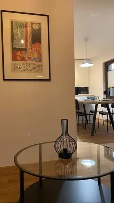 a glass table in a room with a dining room at Lanima in Bled