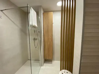 a bathroom with a shower with a glass door at Lanima in Bled