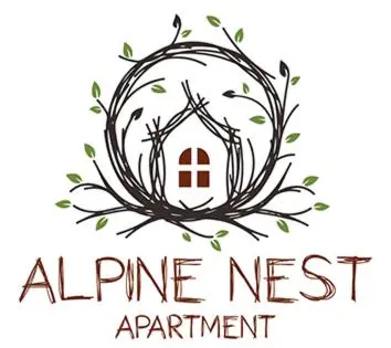 a nest logo with a house in the middle at Alpine Nest in Bled