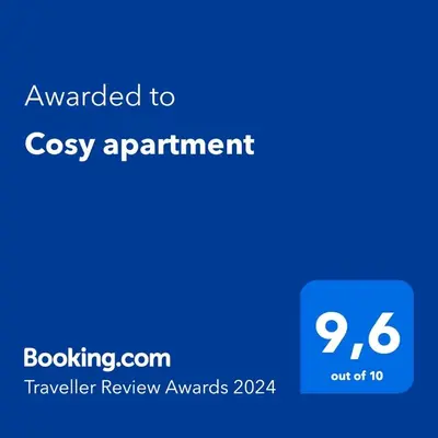 a blue screen with the text awarded to cosy appointment at Cosy apartment in Divača