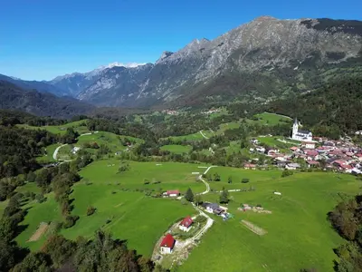 an aerial view of a village in the mountains at Holiday home Dreams in Kobarid