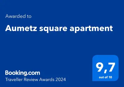 a blue sign with the words summer square appointment at Aumetz square apartment in Idrija