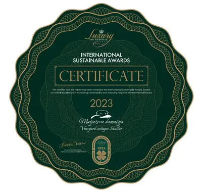 a label for a bottle ofireland international sustainable awards certificate at Glamping Paradise Škatlar in Otočec