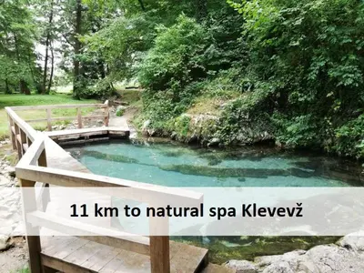 a small pool of water with the words km to natural spa kelvvy at Glamping Paradise Škatlar in Otočec